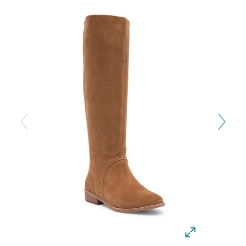 Ugg Daly Tall Boot. (7.5) Leather exterior.